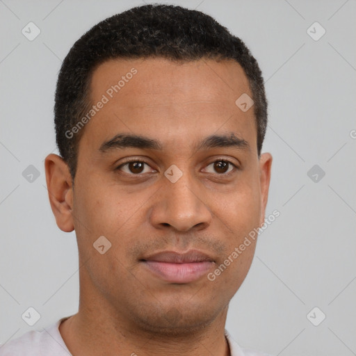 Joyful latino young-adult male with short  brown hair and brown eyes