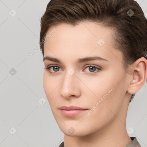 Neutral white young-adult female with short  brown hair and brown eyes