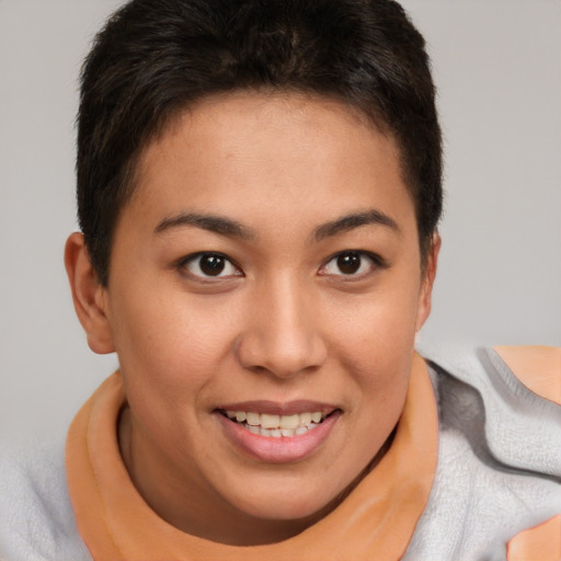 Joyful asian young-adult female with short  brown hair and brown eyes