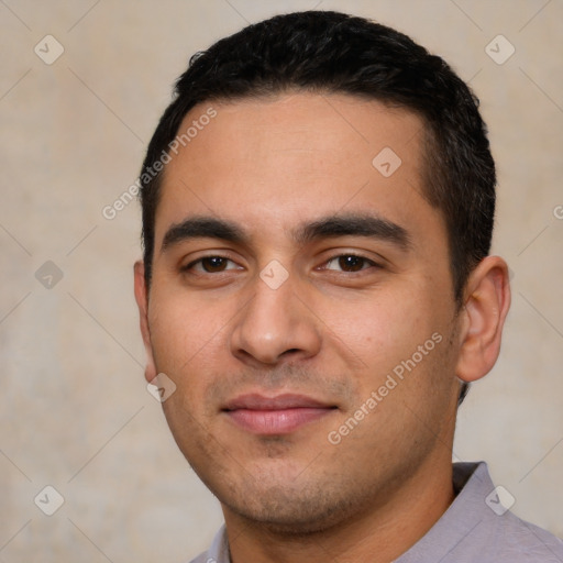 Joyful white young-adult male with short  black hair and brown eyes