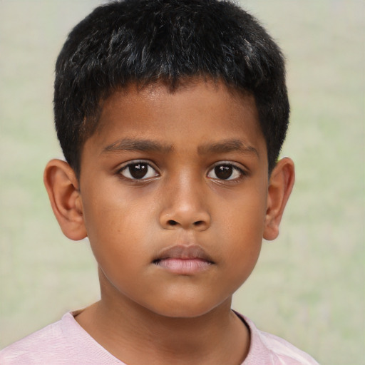 Neutral asian child male with short  brown hair and brown eyes