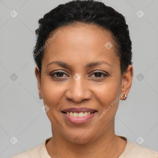 Joyful latino adult female with short  black hair and brown eyes