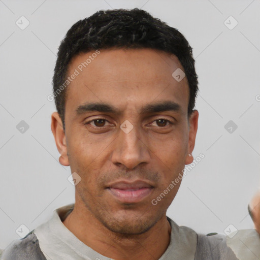 Neutral latino young-adult male with short  black hair and brown eyes