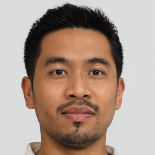 Neutral asian young-adult male with short  black hair and brown eyes