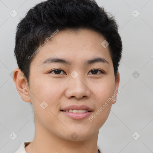 Joyful asian young-adult male with short  brown hair and brown eyes