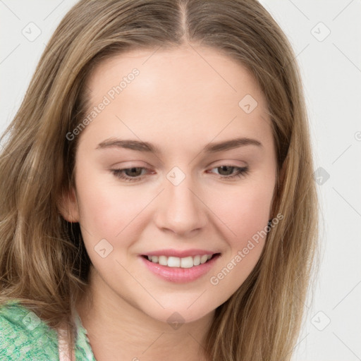 Joyful white young-adult female with long  brown hair and green eyes