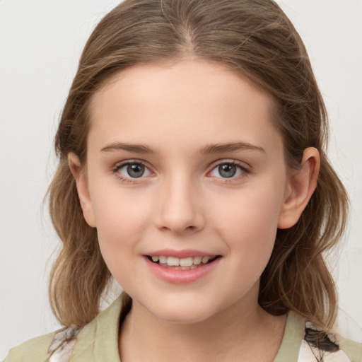 Joyful white child female with medium  brown hair and brown eyes