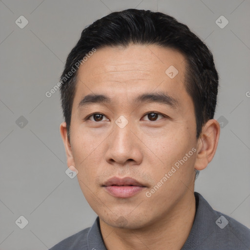 Neutral asian young-adult male with short  black hair and brown eyes