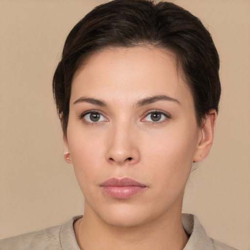 Neutral white young-adult female with short  brown hair and brown eyes