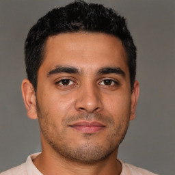 Neutral latino young-adult male with short  brown hair and brown eyes