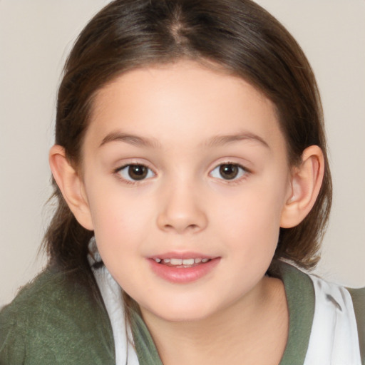 Joyful white child female with medium  brown hair and brown eyes