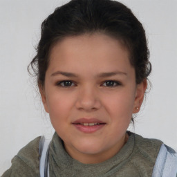 Joyful white child female with short  brown hair and brown eyes