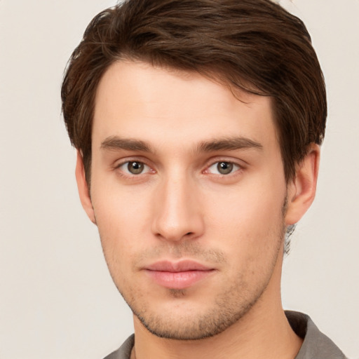 Neutral white young-adult male with short  brown hair and brown eyes