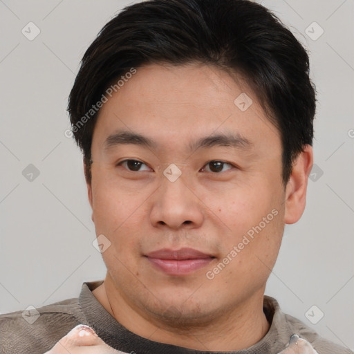 Neutral asian young-adult male with short  brown hair and brown eyes