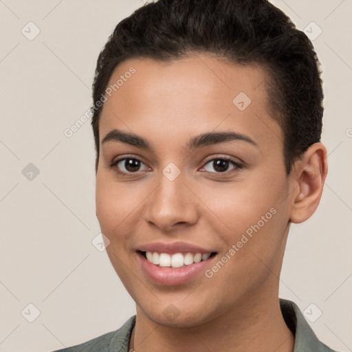 Joyful white young-adult female with short  brown hair and brown eyes