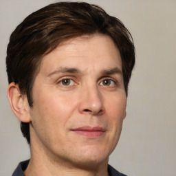 Neutral white adult male with short  brown hair and brown eyes