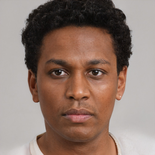 Neutral black young-adult male with short  brown hair and brown eyes