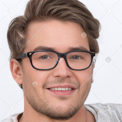 Joyful white young-adult male with short  brown hair and blue eyes