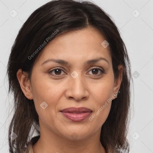 Joyful white adult female with medium  brown hair and brown eyes