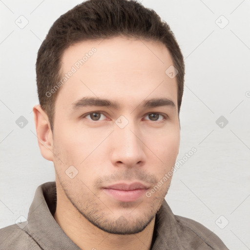 Neutral white young-adult male with short  brown hair and brown eyes