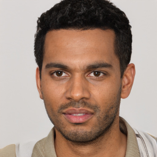 Neutral black young-adult male with short  black hair and brown eyes