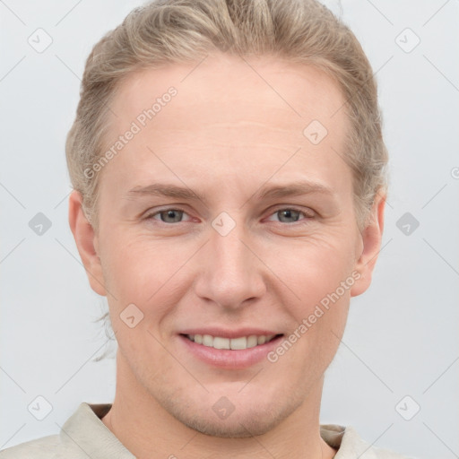 Joyful white adult female with short  brown hair and grey eyes