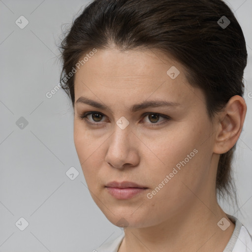 Neutral white young-adult female with medium  brown hair and brown eyes