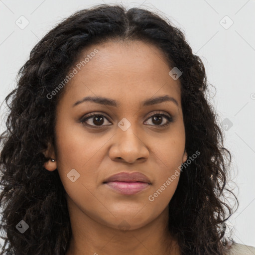 Joyful black young-adult female with long  brown hair and brown eyes