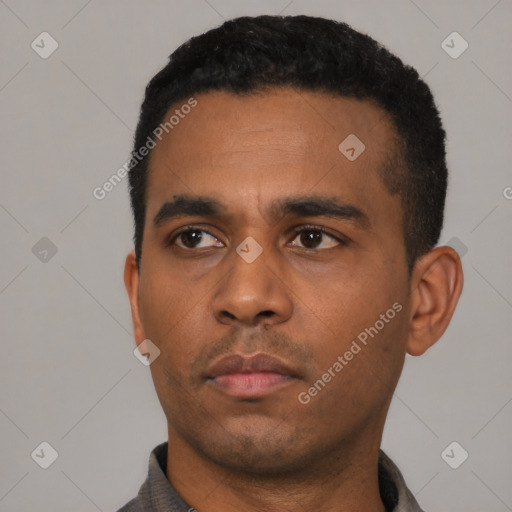 Neutral latino young-adult male with short  black hair and brown eyes