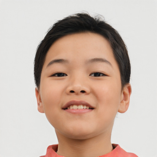 Joyful asian child female with short  brown hair and brown eyes