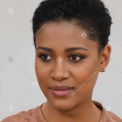 Joyful black young-adult female with short  brown hair and brown eyes