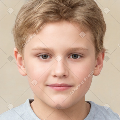 Joyful white child male with short  brown hair and brown eyes