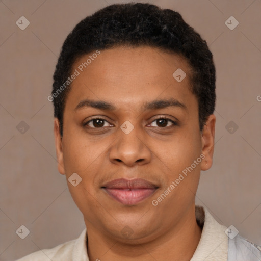 Joyful black young-adult male with short  black hair and brown eyes