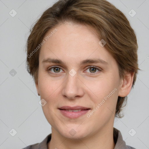 Joyful white young-adult female with medium  brown hair and grey eyes