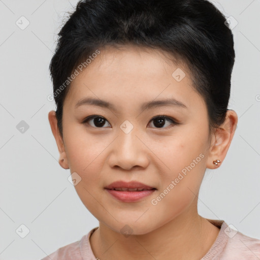 Joyful asian young-adult female with short  brown hair and brown eyes