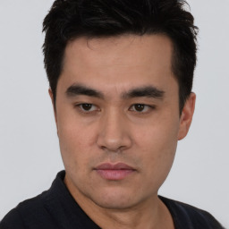 Neutral asian young-adult male with short  black hair and brown eyes