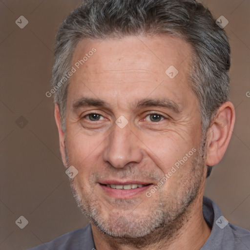 Joyful white middle-aged male with short  brown hair and brown eyes