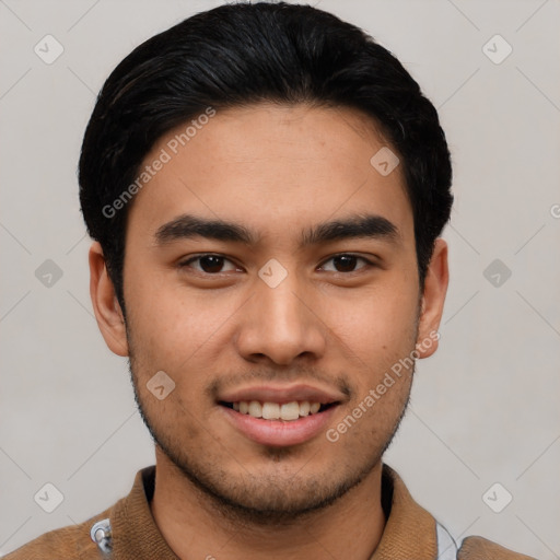 Joyful asian young-adult male with short  black hair and brown eyes