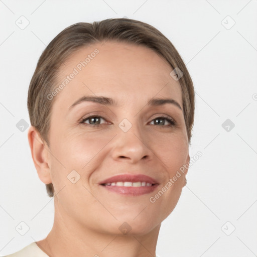 Joyful white young-adult female with short  brown hair and grey eyes