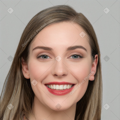 Joyful white young-adult female with long  brown hair and grey eyes