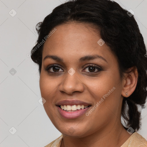 Joyful latino young-adult female with medium  brown hair and brown eyes