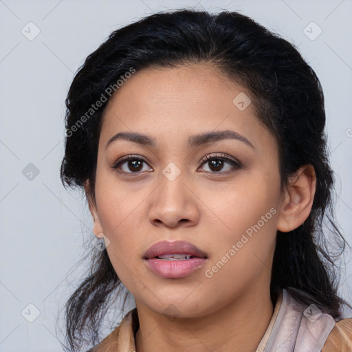 Joyful latino young-adult female with medium  black hair and brown eyes