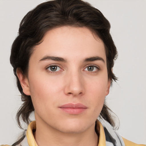 Neutral white young-adult female with medium  brown hair and brown eyes