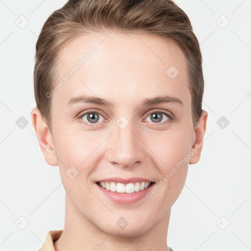 Joyful white young-adult female with short  brown hair and grey eyes