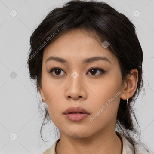 Neutral asian young-adult female with medium  brown hair and brown eyes