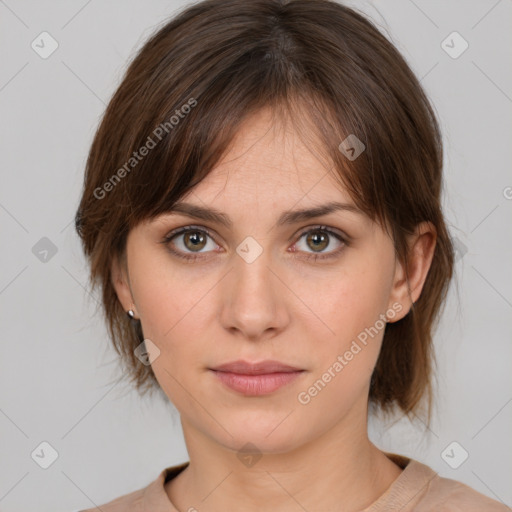 Neutral white young-adult female with medium  brown hair and brown eyes