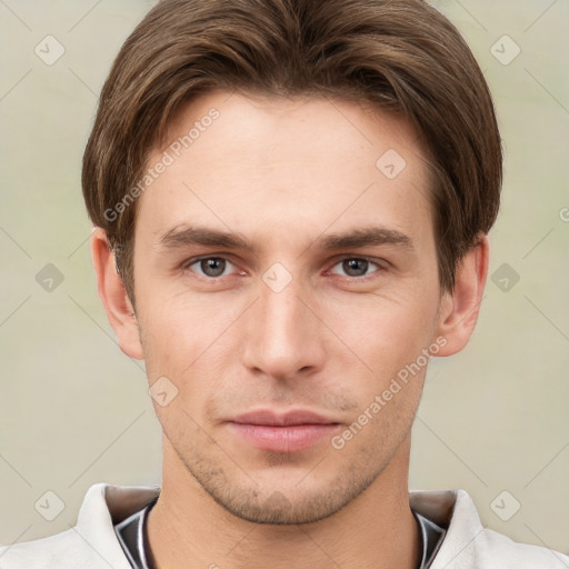 Neutral white young-adult male with short  brown hair and grey eyes