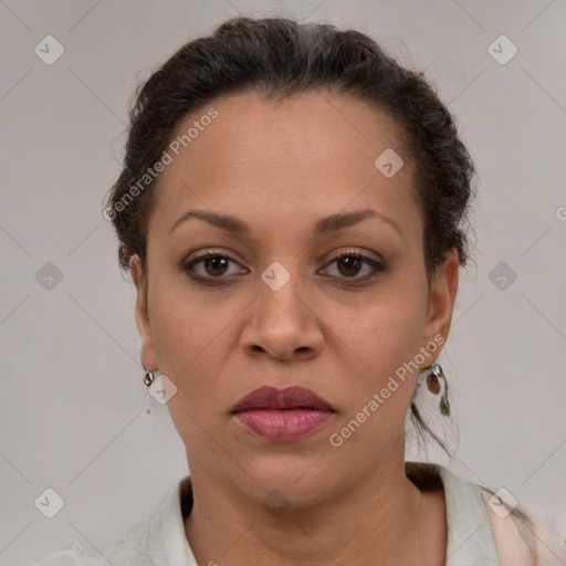 Joyful white adult female with short  brown hair and brown eyes