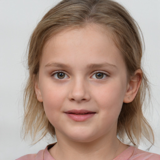 Joyful white child female with medium  brown hair and grey eyes