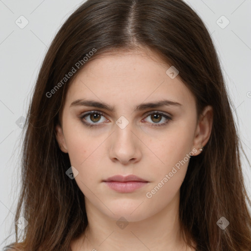 Neutral white young-adult female with long  brown hair and brown eyes